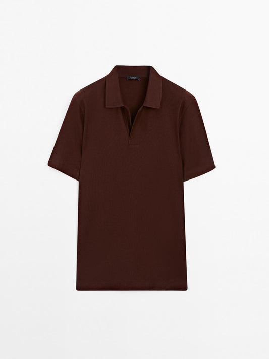 Textured polo shirt with hidden button